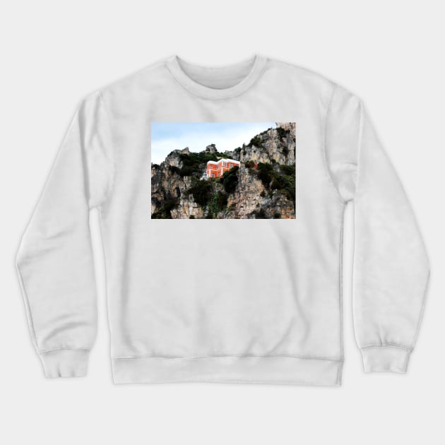 View of a red and white building with lighthouse perching on a cliff in the Amalfi coast Crewneck Sweatshirt by KristinaDrozd